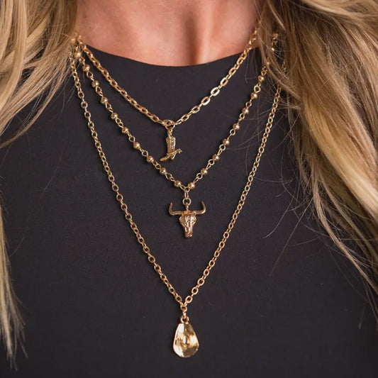 N1442G | WEST & CO GOLD LAYER CHAIN W/COWBOY BOOT & SKULL NECKLACE
