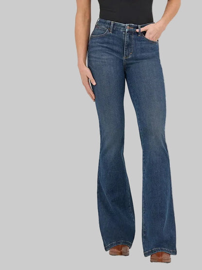 Blue flared jeans worn by a person on a white background