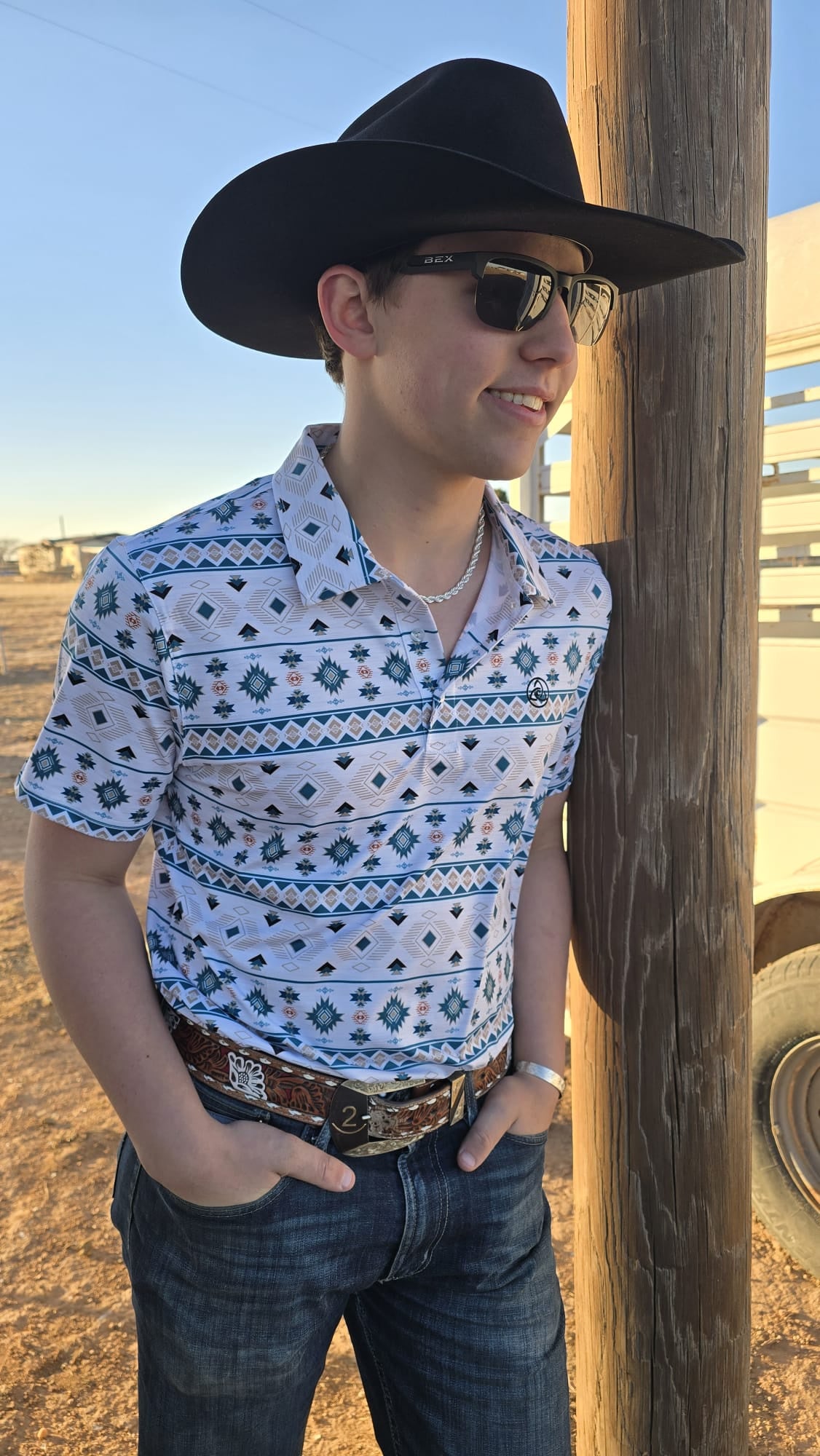 SKCL2026P39 | CUEROLINE TEAL & SALMON AZTEC POLO