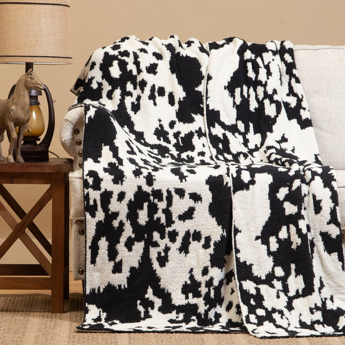 WRANGLER BLACK & WHITE COWHIDE STRETCHY THROW BLANKET